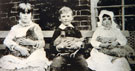 View: FD01192 Frodsham: Board of East Bank Hen Co. Children and chickens.
