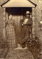 View: FD01452 Frodsham: Un-named man and woman in doorway