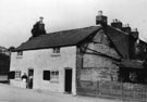 View: FD02140 Frodsham: Bridge Lane, showing cottages.  Fraser House opposite.