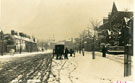 View: FD02213 Frodsham: Main Street in snow.  N.E. The Gables - carts and two cows.