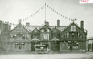 View: FD02357 Frodsham: Bears Paw and open-top car.  Coronation Decorations., 1911. 