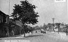 View: FD02486 Frodsham: Looking uphill in High Street to Aitken's Garage on the left.