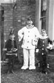 View: FD02537 Frodsham: Water Bob.  Bob Rodgers with sons in carnival dress c.1930