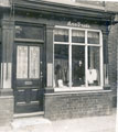 View: FD02595 Frodsham: Lower Church Street. Ann Trude's Millinery and Gowns Shop