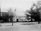 View: FD02754 Frodsham: Half timbered house in Main Street.  Corrugated iron roof.