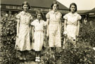 View: FD03153 Frodsham: Four Girls, 1st on left in photo Miss Lewis.  Rose garden Kingsley School