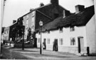 View: FD03169 Frodsham: Thatched Cottages, Lower Main Street (West Bank).  People in doorways.
