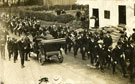 View: FD03190 Frodsham: Procession in Main Street, with car (Reg. No. M2425). 