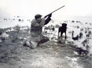 View: FD03281 Frodsham: Wildfowler with dog.  Jack Davies