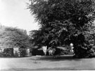 View: FD03296 Frodsham: Castle Park, view from lawn towards Peach Houses