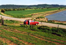 View: FD03408 Frodsham: Overton and Woodhouse Hills from Frodsham Marsh Lagoons.  01/05/1991