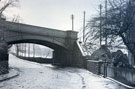 View: FD03584 Frodsham: Old Cast Iron Railway Bridge at west end of Main Street c. 1910. 