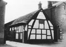 View: FD03612 Frodsham: Cruck barn on Main Street.  On site of Coward's Butchers