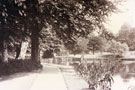 View: FD03650 Frodsham: Castle Park Gardens, view of pond from little gate.
