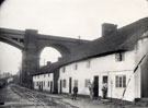 View: FD03672 Frodsham: Old white cottages along quay at Frodsham Bridge, 