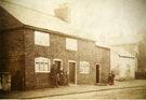 View: FD03854 Frodsham: People outside cottages west end of Main Street. 