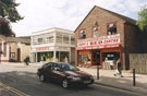 View: FD04327 Frodsham: Hanbury's village shop, original site of Grand Cinema. 