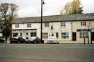 View: FD04381 Frodsham: Cars n' Bikes and other old cottages, north side of Main Street. Frodsham  
