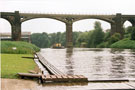 View: FD04389 Frodsham: The barge Panary approaching quay / warehouse under railway viaduct. 