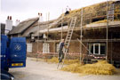 View: FD04415 Frodsham: Thatching Cottage Roof Near Old Hall Main Street. Autumn 2001