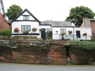 View: FD07656 Frodsham: The Old Cottage LB and exposures of Frodsham