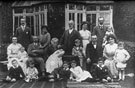View: FDN1095 Frodsham: Linaker family by the summer house.