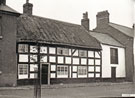 View: FDN2661 Frodsham: Black and White thatched cottage, and slate roof cottage, Main Street