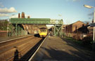 View: FDN2796 Frodsham: Frodsham Station with Chester Train DMU. Footbridge part Panelled.