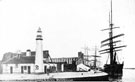 View: c03632 Ellesmere Port: Docks - Lighthouse and shipping 	