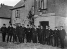 View: c06482 Sandiway: Manchester United football team outside the Blue Cap