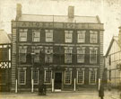 View: c06518 Northwich: Angel Hotel with wooden scaffolding 	