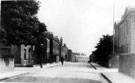 View: c06618 Macclesfield: Cyclist on High Street
