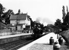 View: c06745 Prestbury: Steam train pulling in to the railway station