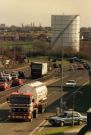 View: c07614 Winsford: Traffic on the High Street and the gasometer