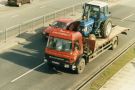 View: c07620 Winsford: Lorry with a tractor, High Street