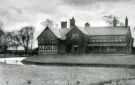 View: c07788 High Legh: Swineyard Hall from across the moat