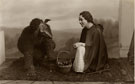 View: c08640 Sandbach: Portrait of Red Riding Hood and the wolf.
