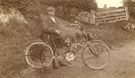 View: c08709 Place unknown: Unidentified biker