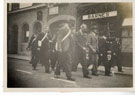 View: c08771 Neston: Auxiliary Fire Service leaders marching down Neston High Street