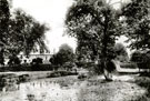 View: c10068 Styal: Village pond and Oak Cottages