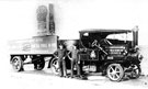 View: c11164 Widnes: Steam engine pulling Restu soap advertisement