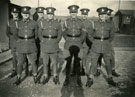 View: c11979 Soldiers photographed outside barracks, place unknown.