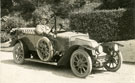 View: c12632 Photograph of "George" in a convertible car.