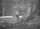 View: ch2827 Woman sitting by River Leet