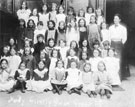 View: ch8881 Girls  from Holy Trinity School,  Rose Fen has bows in Back Row centre