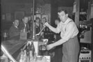 View: ch8947 Former Everton Footballer Bill 'Dixie' Dean, pulling a pint behind the bar of The Dublin Packet, Public  House, Chester