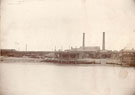 View: p0084 View of landing stage and industrial buildings at Saltney, River Dee