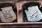 View: p0190 Armorial bearings and plagues from the facade of the Midland Bank formerly the Grosvenor Club Eastgate St. No.47 Colour 9 views