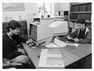 View: p0257 Students using microfiche reader in searchroom at Chester Record Office.