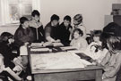 View: p1645 Jaqui Forster Archivist with school group in City Record Office
